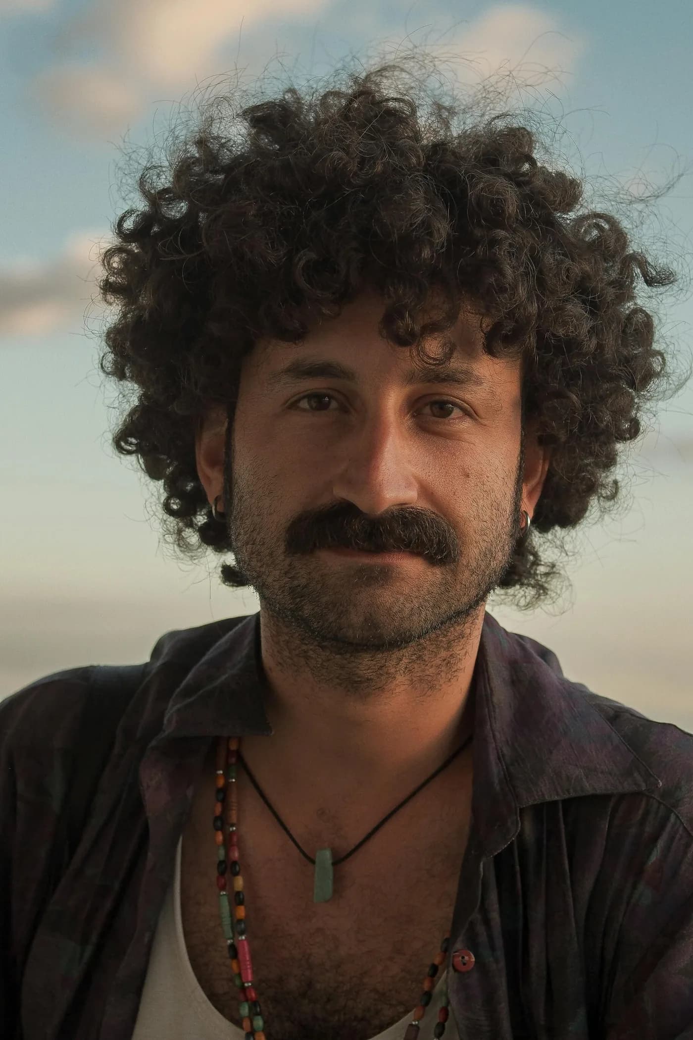 Man with curly hair portrait