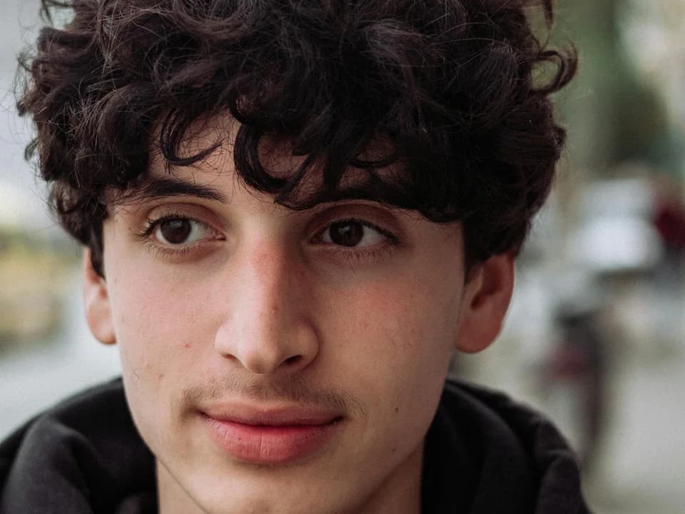 Man with beginner-friendly curly hair routine